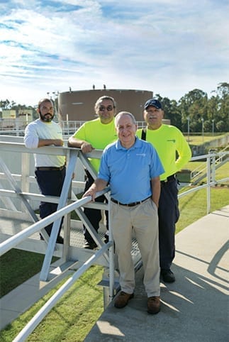 Bob Davis, front, recycled water supervisor, with team members, from left, Brian Fedorick and Daniel Schrock, senior recycled water technicians, and Victor Adams, recycled water technician.